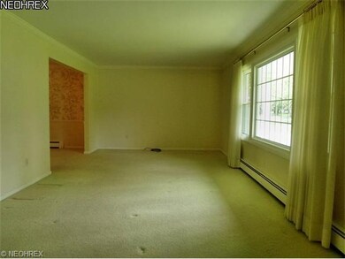 Formal Living Room from entry foyer with opening a