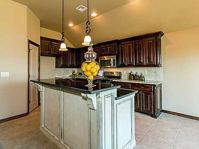 Kitchen. custom painted island with granite
