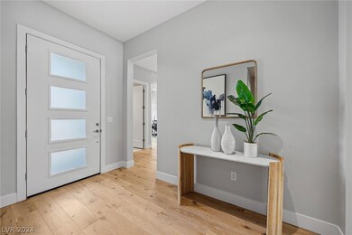 Entry way!  Stunning wood flooring throughout