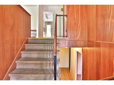 Entry. Cherry Paneling in Entry Foyer & Finished L