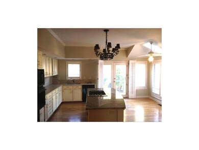 Beautiful sunny eating kitchen. Granite counters a