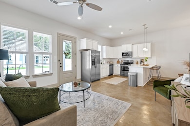 Spacious living, kitchen and dining area!
Model h
