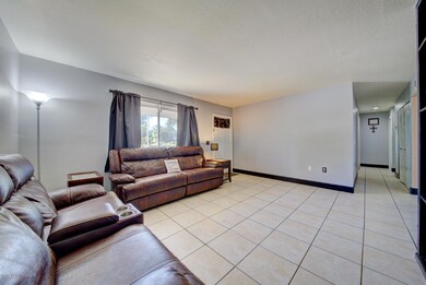 living room with tile floor