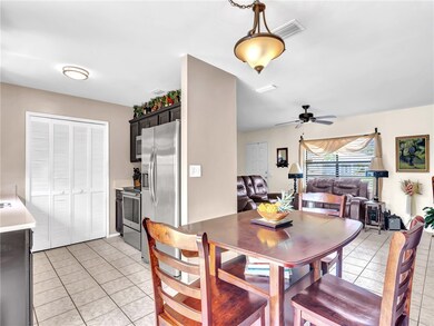 Opposite view of dining area, kitchen and living r