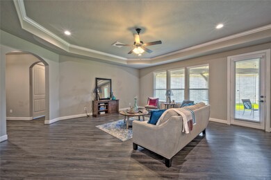 Love the tray ceiling with crown molding.