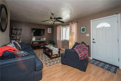The spacious 15x19 living room features today's pa