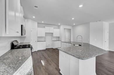 View of Kitchen Facing Front of the Home