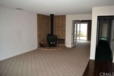 The Living room has a nice woodstove and has a nic