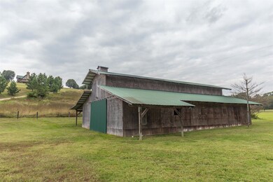 Barn with concrete pad, workshop, electricity and water