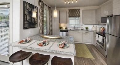 Kitchen with tasteful backsplash, dark wood-type f