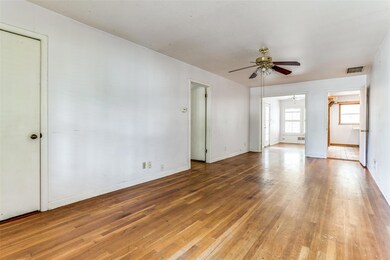 Living room towards Dining and Kitchen