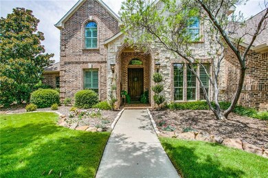 Inviting walk up appeal with brick front porch & g