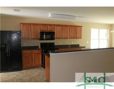 Kitchen. Open plan with Bar to Great Room Area