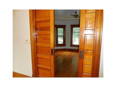. Pocket doors between living room and dining room