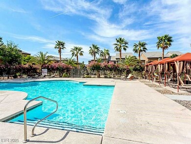 Pool with fence and a patio area