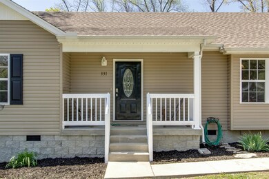 The Charming Front Porch was recently painted for great curb appeal
