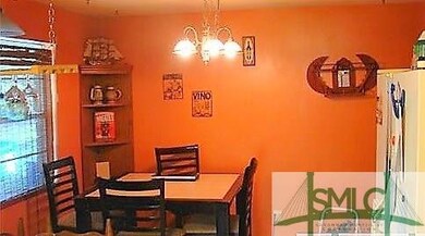 Dining area over looks the backyard.