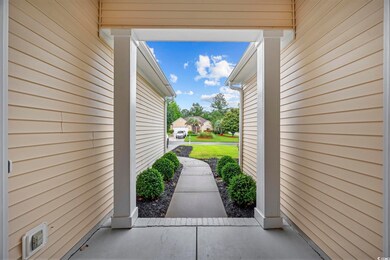 View of property exterior featuring a patio area
