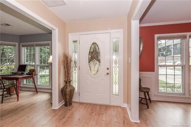 Bright an sunny foyer features fresh paint and new