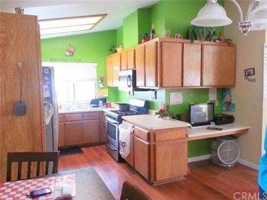 Galley kitchen. Updated stainless steel appliances