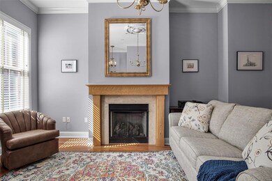 Living room gas fireplace and soaring 10 foot ceil