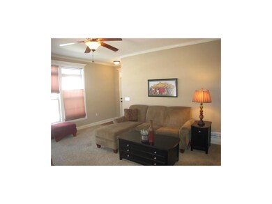 A ceramic tile entry helps keep the frieze carpet 