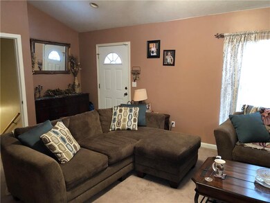 Front entry into living room (downstairs door also