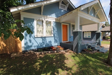 View of front of property featuring covered porch