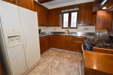 The well equipped kitchen is ready for the cook in