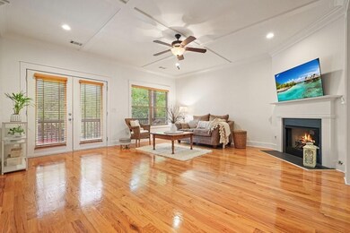 Living Room has corner fireplace with gas logs