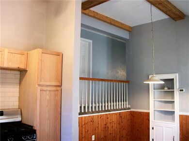 Dining Room with built in cabinet which leads thro