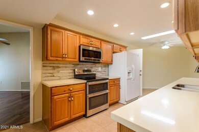 Kitchen view featuring stainless steel double oven