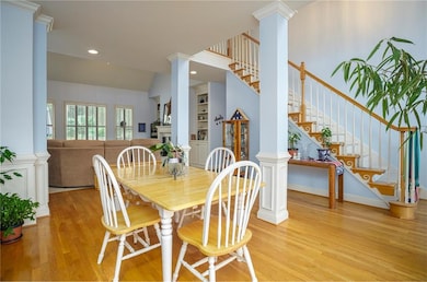 Dining room featuring light wood-type flooring, va