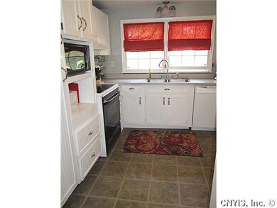 Kitchen. Light & bright with lots of cabinetry and