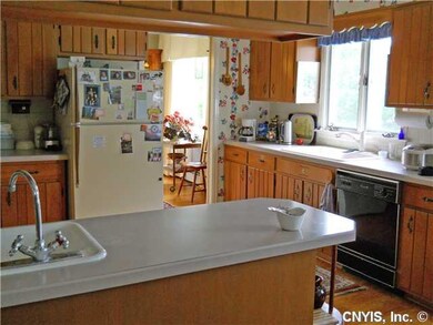 Kitchen Lots of cabinet space and hardwood floors 