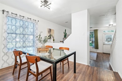 The dining room is elevated & large enough to host the next holiday dinner.