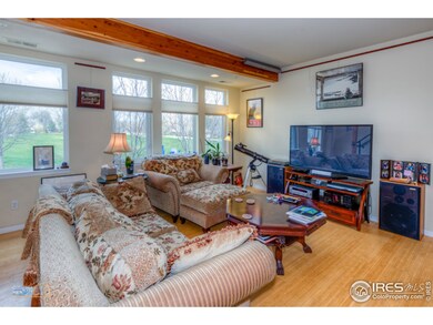 Living Room 1 with exposed wood beams