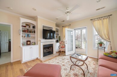 Large family room with woodburning fireplace, hard