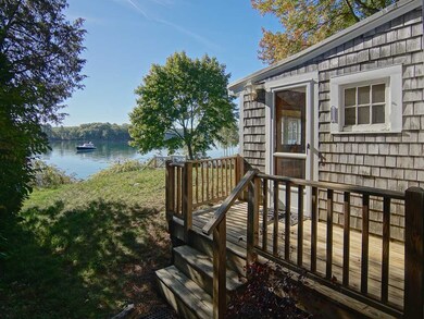 The little side deck offers Little Bay water views