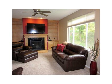 Great Room. Maple built-ins, gas fireplace