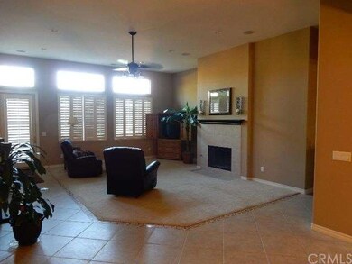 View from eating area to family room. Kitchen to t