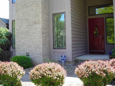 Exterior Front The sheltered entrance leads to a h
