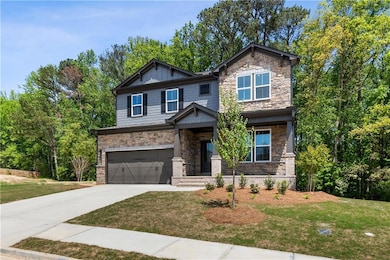 Craftsman inspired home with concrete driveway, st