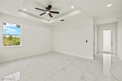 Unfurnished room with baseboards, recessed lightin