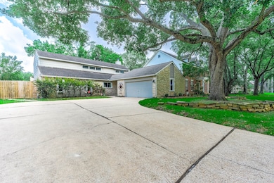 Home features a double wide and long drive way wit