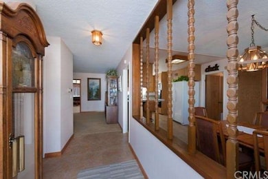 Welcome to the home.  Tile and plush carpeting, ne