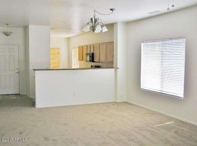 GREAT ROOM LOOKING TO THE KITCHEN