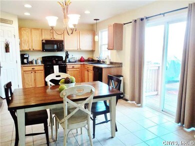 Dining Room. Dining area opens to large deck for e