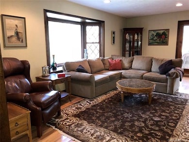The living room, plenty of sunlight through the bay window!
