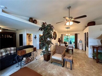 Tiled living room with ceiling fan